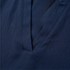 Women's V Neck Rolled Short Sleeve Loose Blouse with Asymmetric Curved Hem