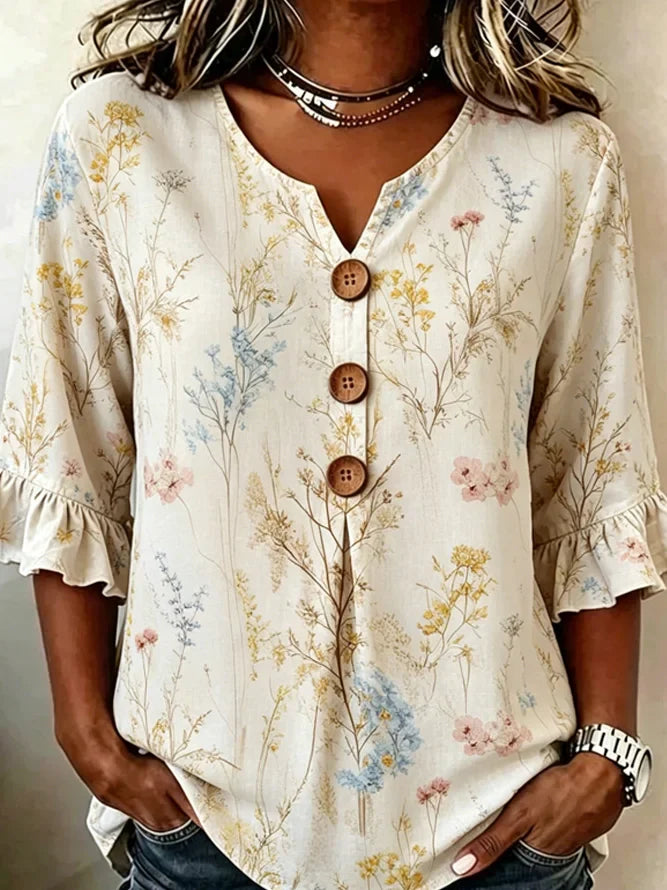 Off White Wild Floral V Neck Three Wooden Button Ruffle Half Sleeve Loose Blouse With Side Pockets